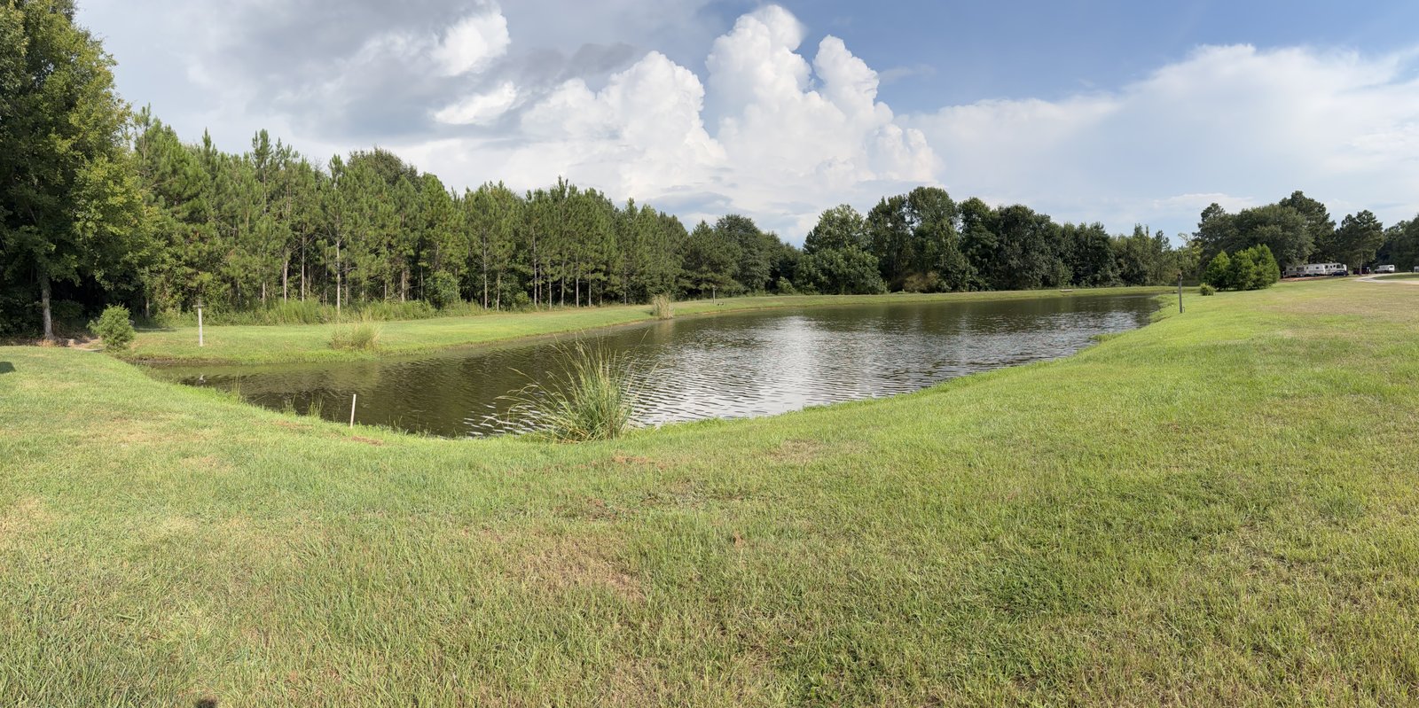 Fully stocked fishing pond at Honeysuckle Farm RV Park in Dublin, Georgia